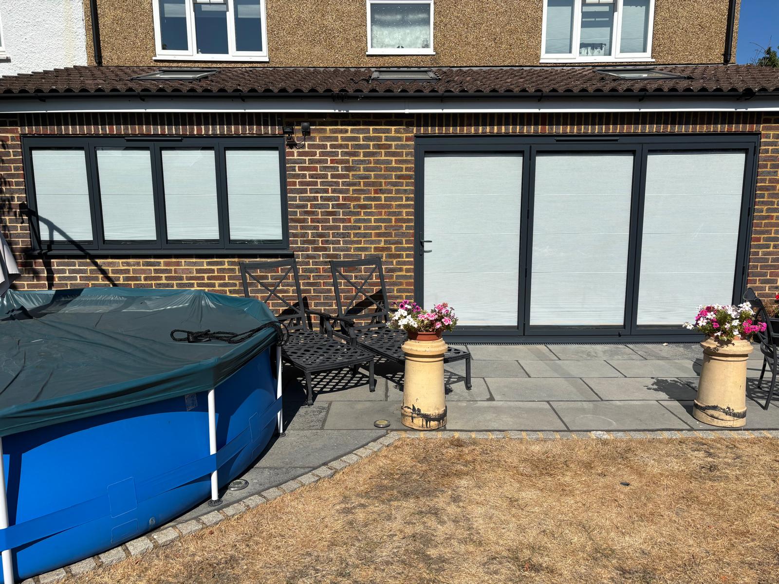 Rear extension window-to-door conversion, brickwork blended seamlessly with the original house