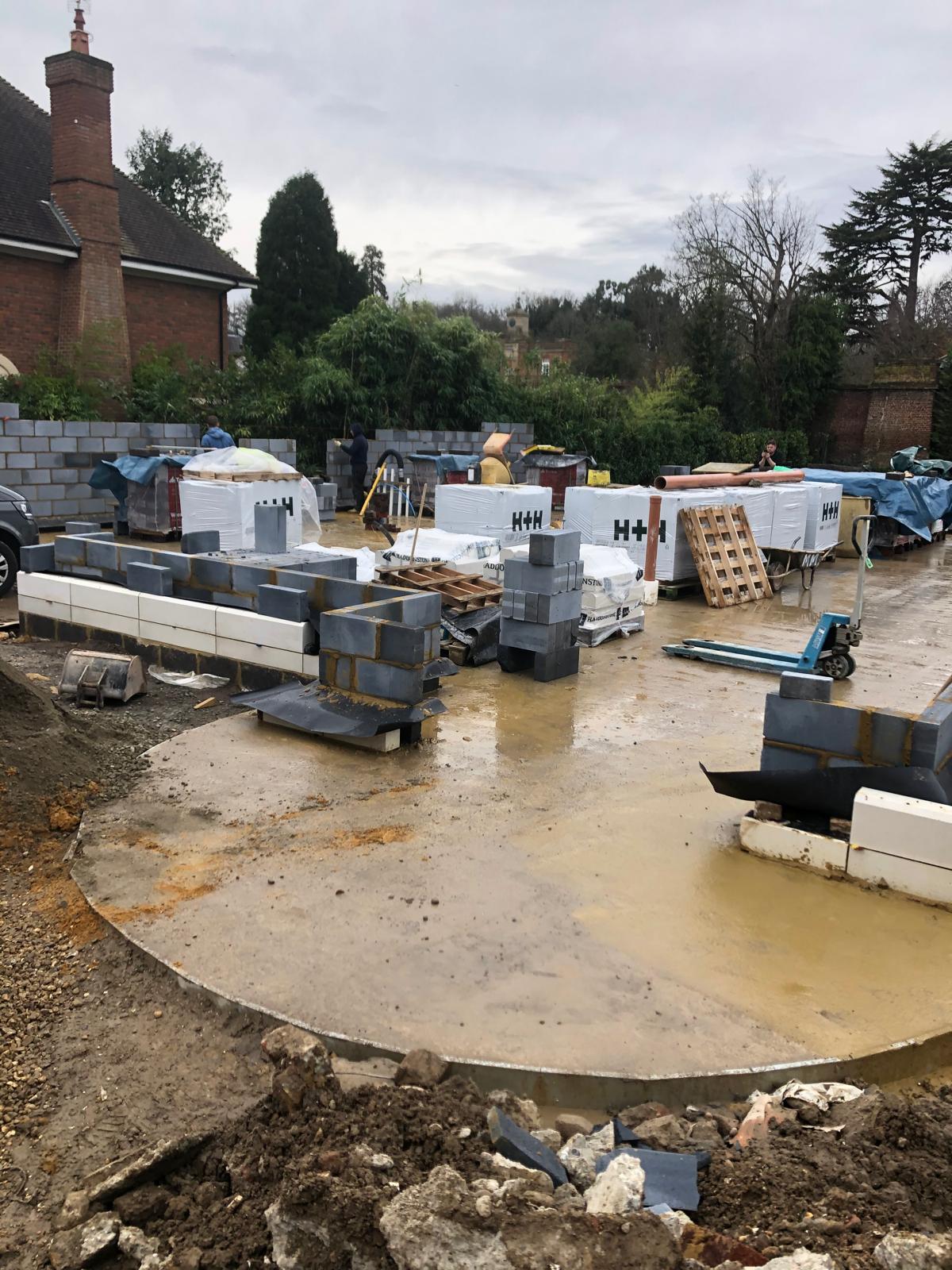Foundation slab and first courses of blockwork on a new-build house site